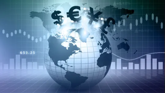 Representación del mundo, con gráficas y las diferentes monedas mundiales